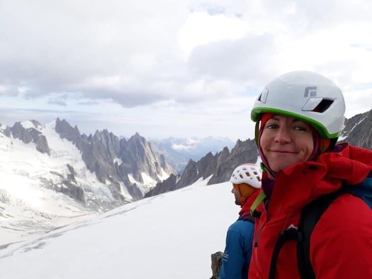 suzanne conquering a peak in the alps, july 2019